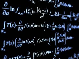 Mathematical formulas written on a blackboard