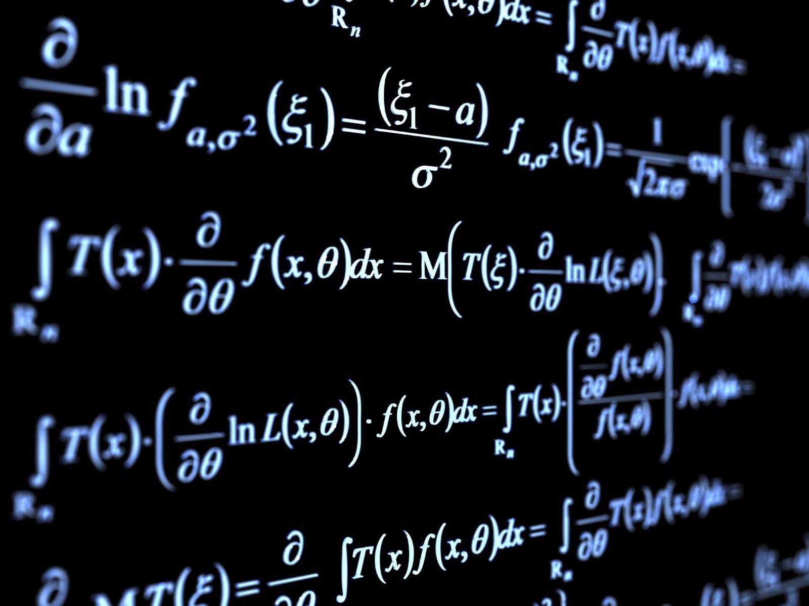 Mathematical formulas written on a blackboard