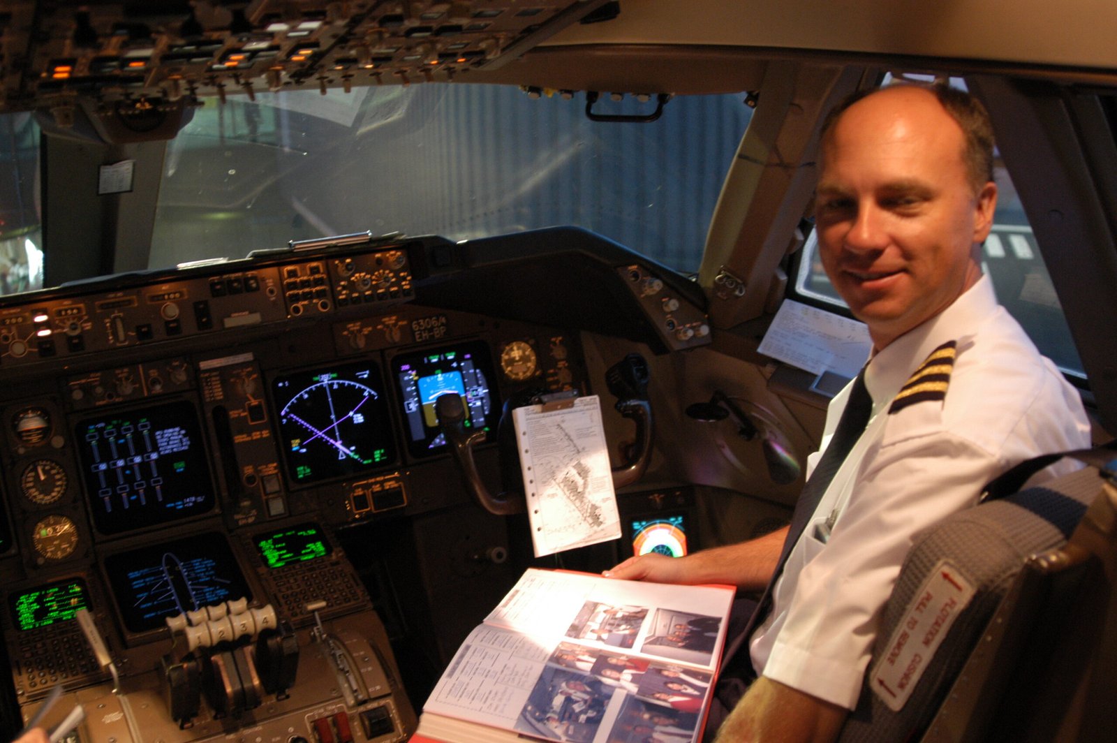 Airplane cockpit with pilot controls